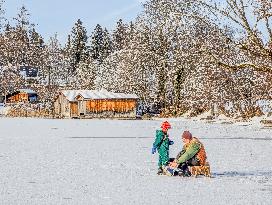 Ice Skating On Frozen Bavarian Lake Staffelsee