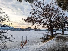 Ice Skating On Frozen Bavarian Lake Staffelsee