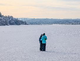 Ice Skating On Frozen Bavarian Lake Staffelsee