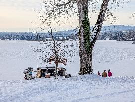 Ice Skating On Frozen Bavarian Lake Staffelsee