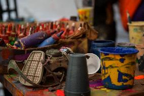 Artisans finish floats for Carnival parade of Blacks and Whites Carnival