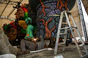 Artisans finish floats for Carnival parade of Blacks and Whites Carnival