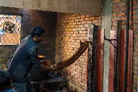 Preparing Chaku For Maghe Sankranti In Kathmandu, Nepal.