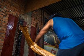 Preparing Chaku For Maghe Sankranti In Kathmandu, Nepal.