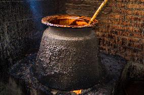 Preparing Chaku For Maghe Sankranti In Kathmandu, Nepal.