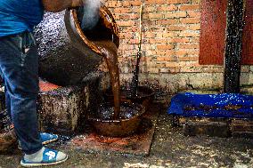 Preparing Chaku For Maghe Sankranti In Kathmandu, Nepal.