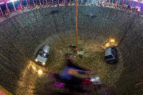 Daredevils Performs Stunts At A State Fair In India.