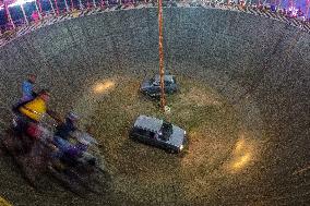 Daredevils Performs Stunts At A State Fair In India.