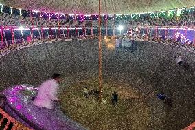 Daredevils Performs Stunts At A State Fair In India.