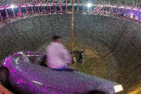 Daredevils Performs Stunts At A State Fair In India.