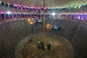 Daredevils Performs Stunts At A State Fair In India.