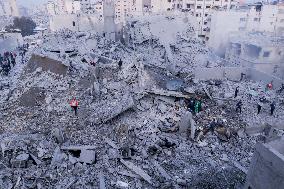 Palestinians Survey The Damage Caused By An Israeli Strike - Gaza