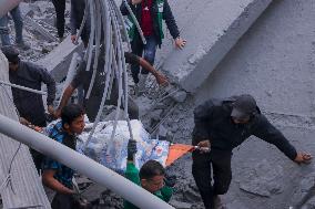 Palestinians Survey The Damage Caused By An Israeli Strike - Gaza