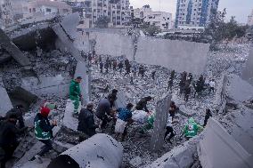 Palestinians Survey The Damage Caused By An Israeli Strike - Gaza