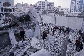 Palestinians Survey The Damage Caused By An Israeli Strike - Gaza