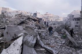 Palestinians Survey The Damage Caused By An Israeli Strike - Gaza