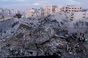 Palestinians Survey The Damage Caused By An Israeli Strike - Gaza