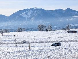 Cars On Snow-covered Roads In Bavaria