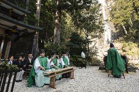 Ritual at waterfall in western Japan