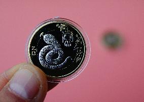 Year of The Snake Commemorative Coin Investment