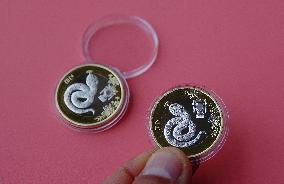 Year of The Snake Commemorative Coin Investment