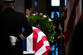 President Jimmy Carter lies in state in the Capitol rotunda