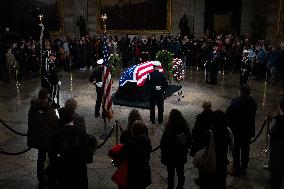 President Jimmy Carter lies in state in the Capitol rotunda