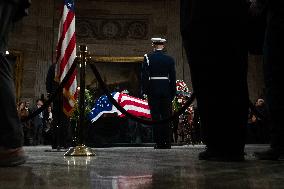 President Jimmy Carter lies in state in the Capitol rotunda