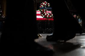 President Jimmy Carter lies in state in the Capitol rotunda