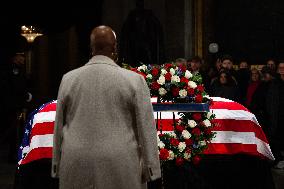 President Jimmy Carter lies in state in the Capitol rotunda