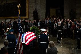 President Jimmy Carter lies in state in the Capitol rotunda