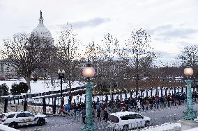 Thousands Visit Jimmy Carter As He Lay In State At U.S. Capitol