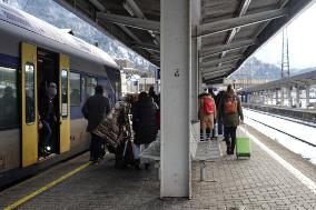 Travelers At Kufstein Station In Austria