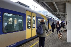 Travelers At Kufstein Station In Austria