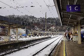 Travelers At Kufstein Station In Austria