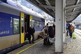 Travelers At Kufstein Station In Austria