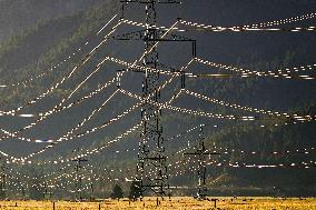 Power Lines In Alpine Landscape