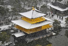 Snow-covered Kinkaku-ji temple