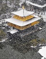 Snow-covered Kinkaku-ji temple