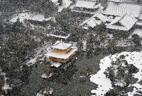 Snow-covered Kinkaku-ji temple