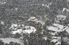 Snow-covered Kinkaku-ji temple