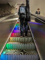 People Using Underground Escalators In Stockholm