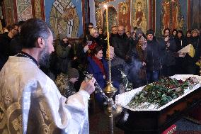 Kyiv pays last respects to marine officer Andrii Kuzmenko