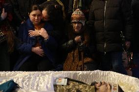Kyiv pays last respects to marine officer Andrii Kuzmenko