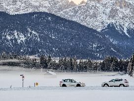 Two Cars On A Slippery And Icy Road