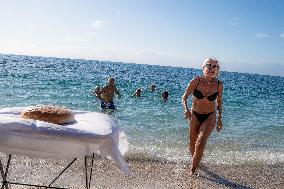 Winter Swimmers Celebrate The New Year On A Beach In Athens
