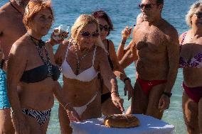 Winter Swimmers Celebrate The New Year On A Beach In Athens