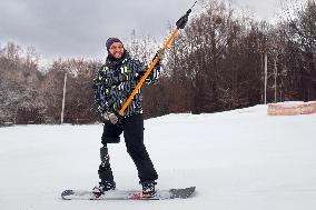 Ukrainian war veterans visit adaptive skiing training session in Kyiv