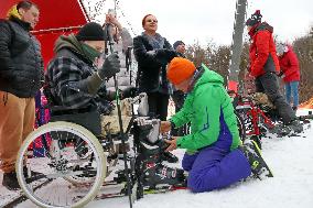 Ukrainian war veterans visit adaptive skiing training session in Kyiv