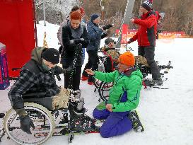 Ukrainian war veterans visit adaptive skiing training session in Kyiv